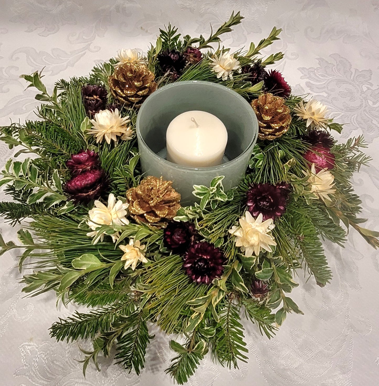 Fresh Evergreen and Dried Flowers Centerpiece with Candle