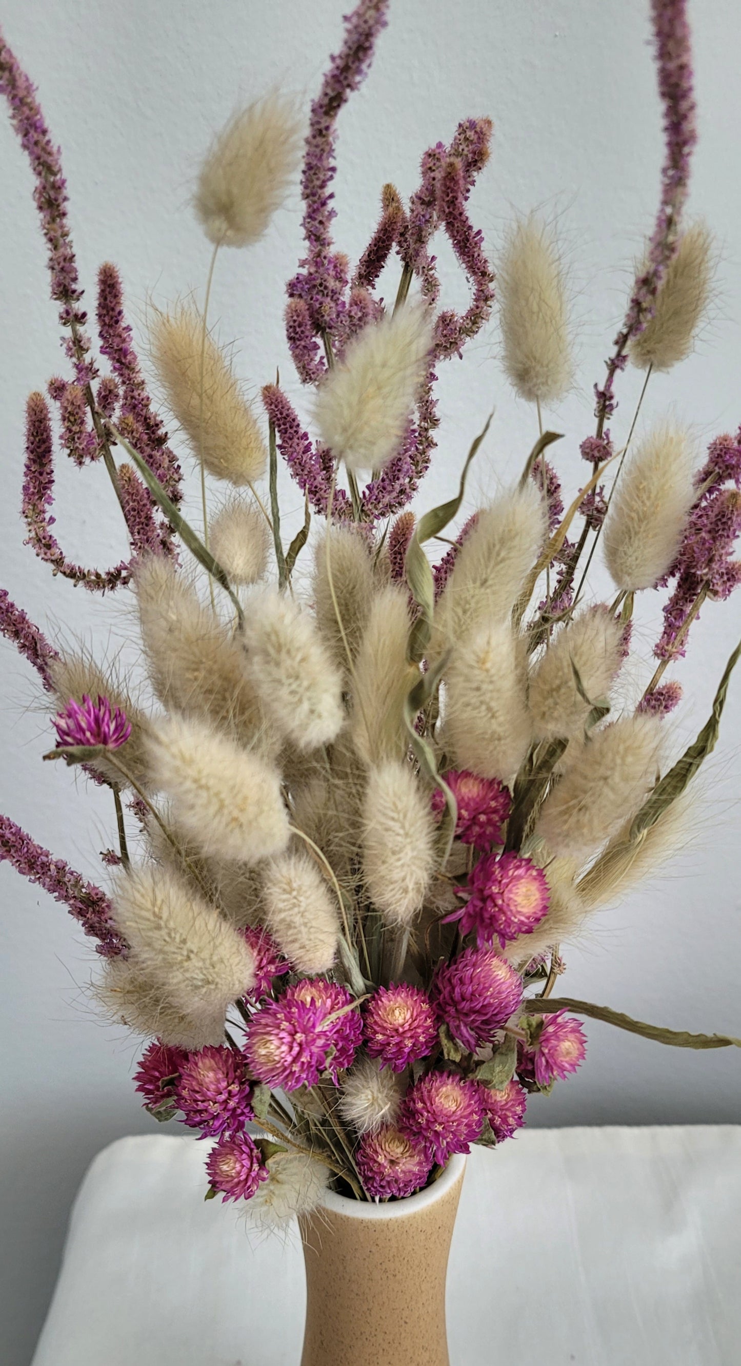 Dried Flowers in a small ceramic vase